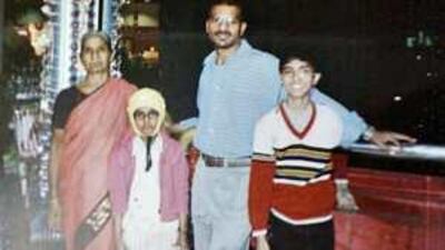 Kadali Prasad, son Ketan, daughter Kavita and the children's grandmother.