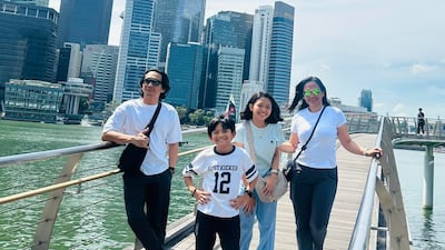 The Aguirre family in happy times during a trip to Singapore. Photo: Aezel Aguirre / Facebook