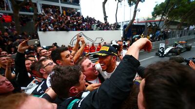 Lewis Hamilton celebrates with his team after winning the Monaco Grand Prix. Dan Istitene / Getty Images