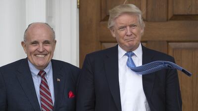 US President Donald Trump with former New York City Mayor Rudy Giuliani at the clubhouse of the Trump National Golf Club in Bedminster, New Jersey in November 2016. Don Emmert/ AFP Photo