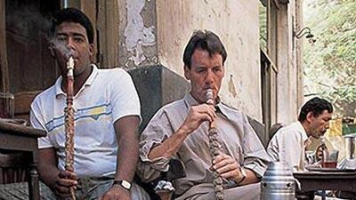 Michael Palin smokes shisha in Saudi Arabia in an episode of Travels with Palin.