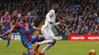 Crystal Palace's Damien Delaney fouls Liverpool's Christian Benteke resulting in a penalty. Reuters / Eddie Keogh