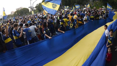 Supporters of Boca Juniors gather at Lezama park in Buenos Aires. AFP