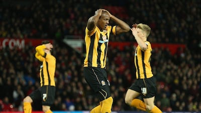 Tom Elliott of Cambridge United reacts after hitting the post against Manchester United in their FA Cup replay on Tuesday night. Clive Mason / Getty Images