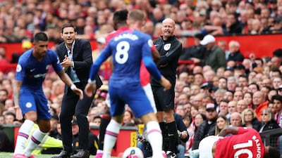 Lampard gestures from the touchline during the game. Getty
