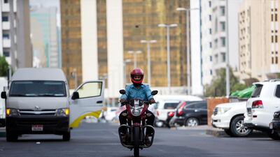 A delivery driver in Abu Dhabi. Christopher Pike / The National