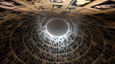 A view from below shows pictures of Jews killed in the Holocaust displayed at the Hall of Names in the Holocaust History Museum at the Yad Vashem World Holocaust Remembrance Center in Jerusalem. Reuters