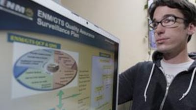 Blake Sifton shows some of the US government security documents found on a scrapped Northrop Grumman hard drive.