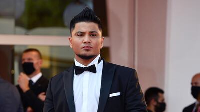 Lebanese-born actor Hussein Eliraqui arrives for the screening of 'Und Morgen Die Ganze Welt' at the 77th Venice Film Festival on September 10, 2020. AFP
