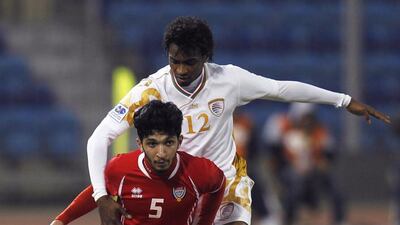 Amer Abdulrahman, bottom, could play a pivotal role in the midfield for the UAE on Wednesday night against Norway. Mohammed Dabbous / Reuters