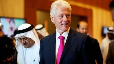 Bill Clinton leaves after opening the Gems American Academy campus in Abu Dhabi.