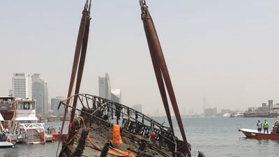 Another shipwreck is salvaged from Dubai Creek. Photo: Dubai Municipality