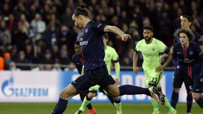 Zlatan Ibrahimovic of Paris Saint-Germain shoots a penalty kick during the Uefa Champions League quarter final first leg football match between Paris Saint-Germain and Manchester City FC at the Parc des Princes Stadium in Paris, France, 06 April 2016. EPA/YOAN VALAT