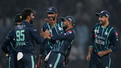 Pakistan's players celebrate after the dismissal of England's Dawid Malan in Lahore. AFP