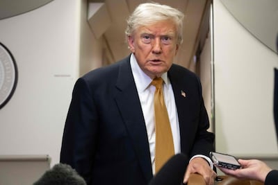 Mr Trump speaks with the media aboard Air Force One shortly after departure from Mildenhall Air Force Base in the United Kingdom, after he switched from the old VC-25A Air Force One to the newer VC-25B Bridge Air Force One, en route to Washington on July 8, 2026. AFP