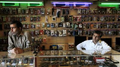 Business has slowed for the owners of a mobile phone shop in Marikana in South Africa with the drawn-out strike of mineworkers. Siphiwe Sibeko / Reuters