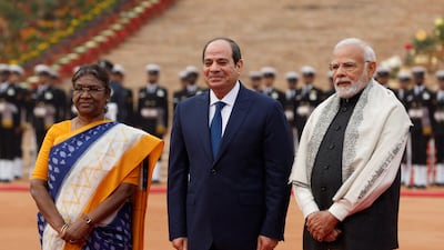 Indian President Droupadi Murmu, Mr El Sisi and Mr Modi at a reception outside the Rashtrapati Bhavan presidential residence in New Delhi. Reuters
