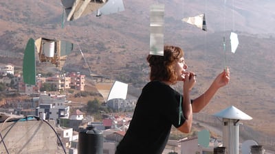Artist Randa Maddah in her village of Majdal Shams, in Golan Heights. Photo: Tabari Art Space