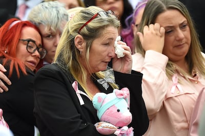 Thomas Cashman allegedly also shot at Oliva's mother, Cheryl Korbel, seen here at her daughter's funeral last month. Getty