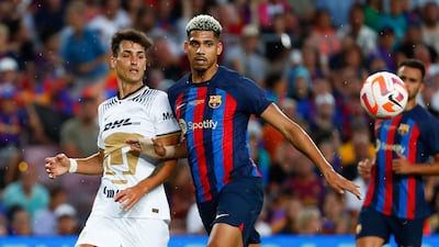 Ronald Araujo 7 - A fan favourite, the Uruguayan led a blessed life in the first half, with most of the ball in front of him. AP Photo