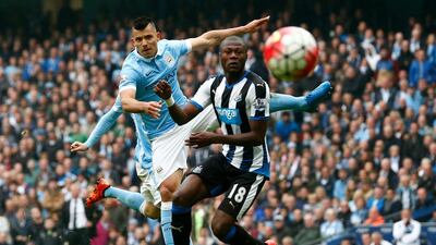 Sergio Aguero scores his fourth and Manchester City's fifth goal against Newcastle United. Dean Mouhtaropoulos / Getty Images