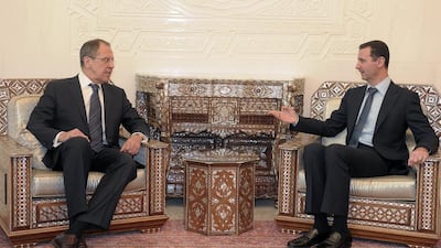 Syrian president Bashar Al Assad, right, with Russian foreign minister Sergey Lavrov in Damascus, in 2012. AP Photo