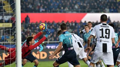 Cristiano Ronaldo of Juventus scores the equalizing goal (2-2) during the Serie A match between Atalanta BC and Juventus at Stadio Atleti Azzurri d'Italia in Bergamo, Italy. Getty Images