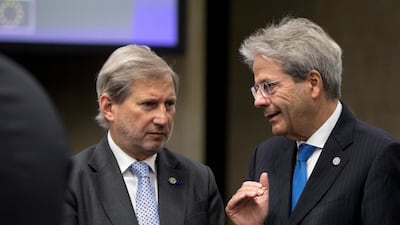Johannes Hahn, European Commissioner for European Neighbourhood Policy and Enlargement Negotiations (left) speaks with Italian Prime Minister Paolo Gentiloni during a round table discussion at an informal European Union (EU) summit with Western Balkans countries at the National Palace of Culture in Sofia, Bulgaria. Virginia Mayo / EPA