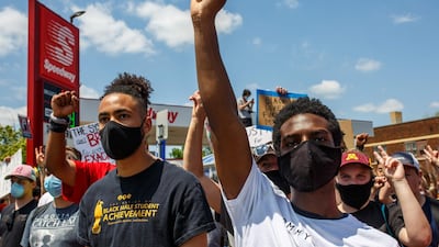Protesters call for justice for George Floyd during his brother Terrence's visit, outside the Cup Foods on June 1, 2020 in Minneapolis, Minnesota. AFP