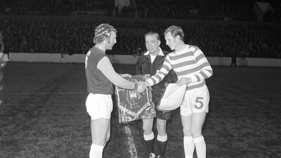 West Ham United captain Bobby Moore, left, exchanges pennants Celtic captain Billy McNeill prior to playing in Bobby Moore's testimonial match at the Boleyn Ground in Upton Park, London on 16th November 1970. The match would end in a 3-3 draw. Getty Images