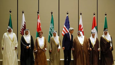 GCC foreign ministers, including UAE Minister of State for Foreign Affairs Anwar Gargash, pose for a family picture with US secretary of state John Kerry and GCC secretary general Abdullatif bin Rashid Al Zayani in Manama on April 7, 2016. Jonathan Ernst/AFP/Pool