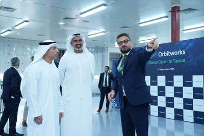 Syed Basar Shueb, centre, at IHC's satellite manufacturing firm Orbitworks in Abu Dhabi. Photo: IHC