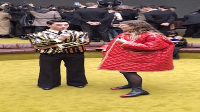 A striped gold jacket and quilted patent leather at Gucci