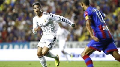 Cristiano Ronaldo, left, scored Real Madrid's winner in the last minute of injury time after the Spanish giants game from behind to beat Levante 3-2. Biel Alino / EPA