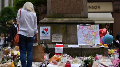 Floral tributes at Albert Square in Manchester, placed to commemorate the victims of the terrorist attack at the Manchester Arena on May 22, 2017. AFP