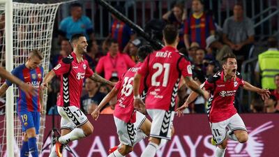 Ibai Gomez, right, in celebration after scoring the winning goal against Barcelona at the Camp Nou on Saturday. Albert Gea / Reuters