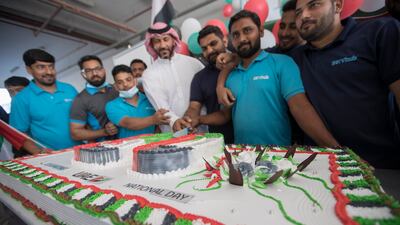 A team of 450 construction workers that helped bring Expo 2020 Dubai to life joined in with the Golden Jubilee celebrations on Thursday morning. Photos by Ruel Pableo for The National