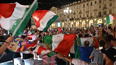 Italy fans celebrate in Turin.