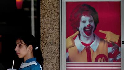 The growing popularity of fast food India is one of the reasons for the proliferation of lifestyle diseases in India. Manan Vatsyayana / AFP