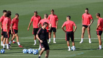 Real Madrid manager Julen Lopetegui, front, takes part in training ahead of the Uefa Champions League match against Roma. AP Photo