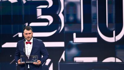 Marcin Oleksy speaks to the audience after receiving the Fifa Puskas Award 2022. Getty Images