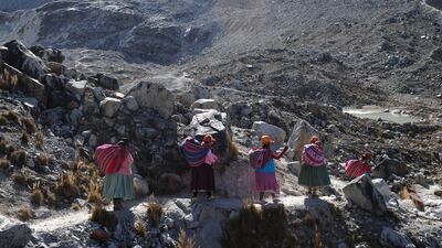 Aymara indigenous women climbers begin their ascent of Huayna Potosi, Bolivia. The Climbing Cholitas of Bolivia Warmis are a group dedicated to campaigning for the rights of indigenous women through mountaineering.