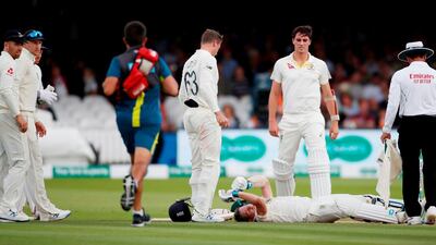 Australia's Steve Smith lays on the floor after being hit by a ball from England's Jofra Archer. Paul Childs / Reuters