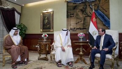 Sheikh Mohammed, centre with Mr Al Sisi, right discus ways to strengthen fraternal cooperation and strategic relations between the UAE and Egypt with Sheikh Abdullah bin Zayed Al Nahyan, UAE Minister of Foreign Affairs, looking on. Mohammed Al Hammadi / Crown Prince Court — Abu Dhabi