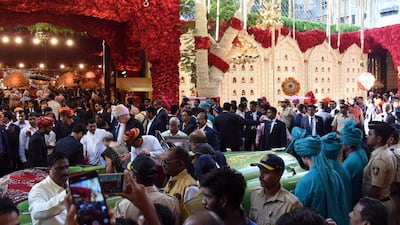The marriage procession or baarat typically involves dancers, drummers and the groom's side of the family. AFP
