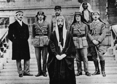 King Faisal I of Iraq, centre, pictured at the 1919 Peace Conference in Paris. Behind him to the right is Lawrence of Arabia. Getty