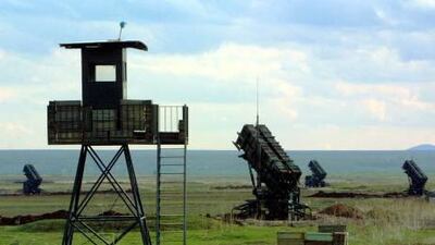 Nato is poised to deploy missile defence systems along the 900 kilometre border between Turkey and Syria, as fresh fighting breaks out near a Turkish border town.