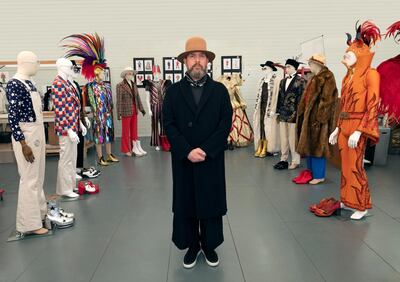 'Rocketman' costume designer Darrell Warner with some of the looks he created for the film