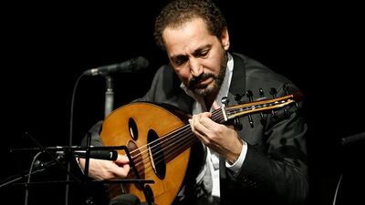 SHARJAH, UNITED ARAB EMIRATES, JANUARY 15, 2013. Naseer Shamma, the Iraqi Oud player, performs at the Al Qasba Theatre in Sharjah. (Photo: Antonie Robertson/The National) Journalist: Saeed Saeed. Section: Arts & Life.