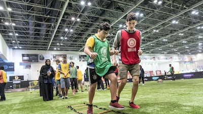 Children take part in track and field drills during a six-week Special Olympics summer camp being held in Dubai. All photos: Antonie Robertson / The National